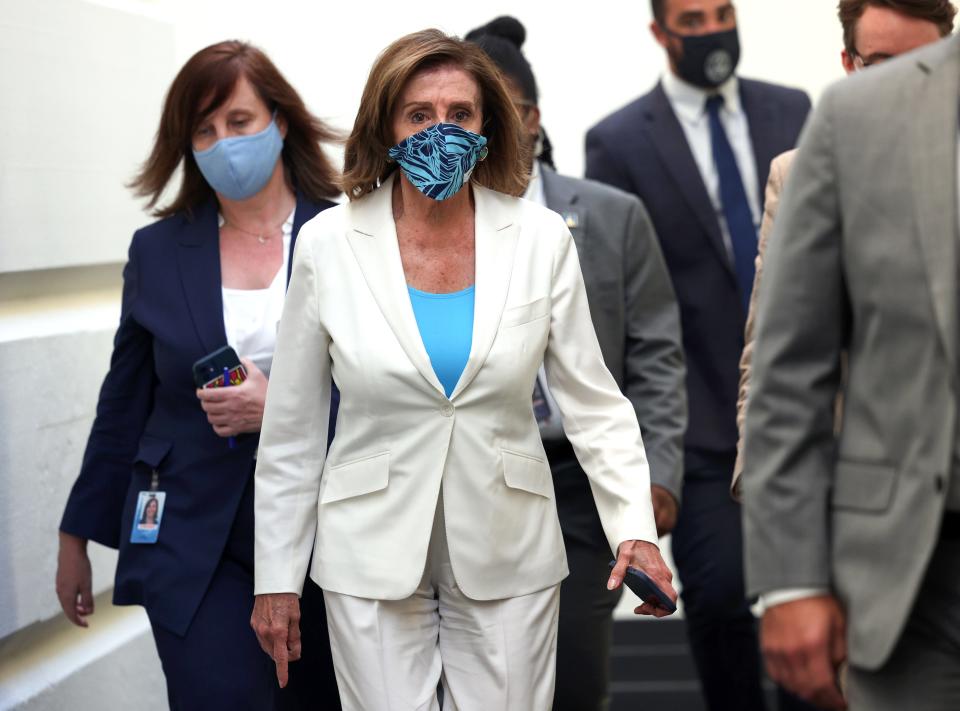 House Speaker Nancy Pelosi, D-Calif., leaves a Democratic caucus meeting at the Capitol on August 23, 2021 in Washington, D.C. The House has returned from their August recess to vote on the infrastructure and budget reconciliation bills.