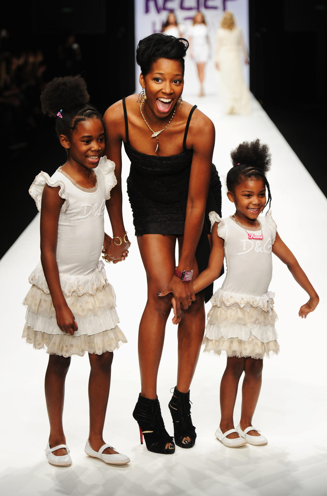 The star walked the catwalk for Naomi Campbell's Fashion For Relief Haiti show with her two eldest children, Teja and Tiani, in 2010. (Getty Images)