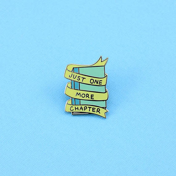 <a href="https://www.etsy.com/listing/524730342/just-one-more-chapter-enamel-pin?ga_order=most_relevant&amp;ga_search_type=all&amp;ga_view_type=gallery&amp;ga_search_query=introvert&amp;ref=sc_gallery_4&amp;plkey=ee8ea05272cbf0216aa9ed8a3e3788726842c16d:524730342" target="_blank">Shop it here</a>.&nbsp;