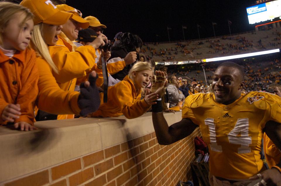 Tennessee cornerback Eric Berry (14) greets fans after the 31-16 win over Vanderbilt on Saturday, Nov. 21, 2009 at Neyland Stadium.