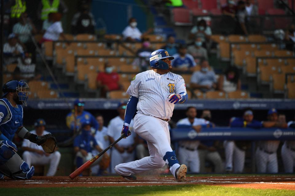 Venezuela's Pablo Sandoval hits the ball during the Caribbean Series baseball match against Colombia at the Quisqueya stadium in Santo Domingo, on January 28, 2022. (Photo by Federico PARRA / AFP) (Photo by FEDERICO PARRA/AFP via Getty Images)