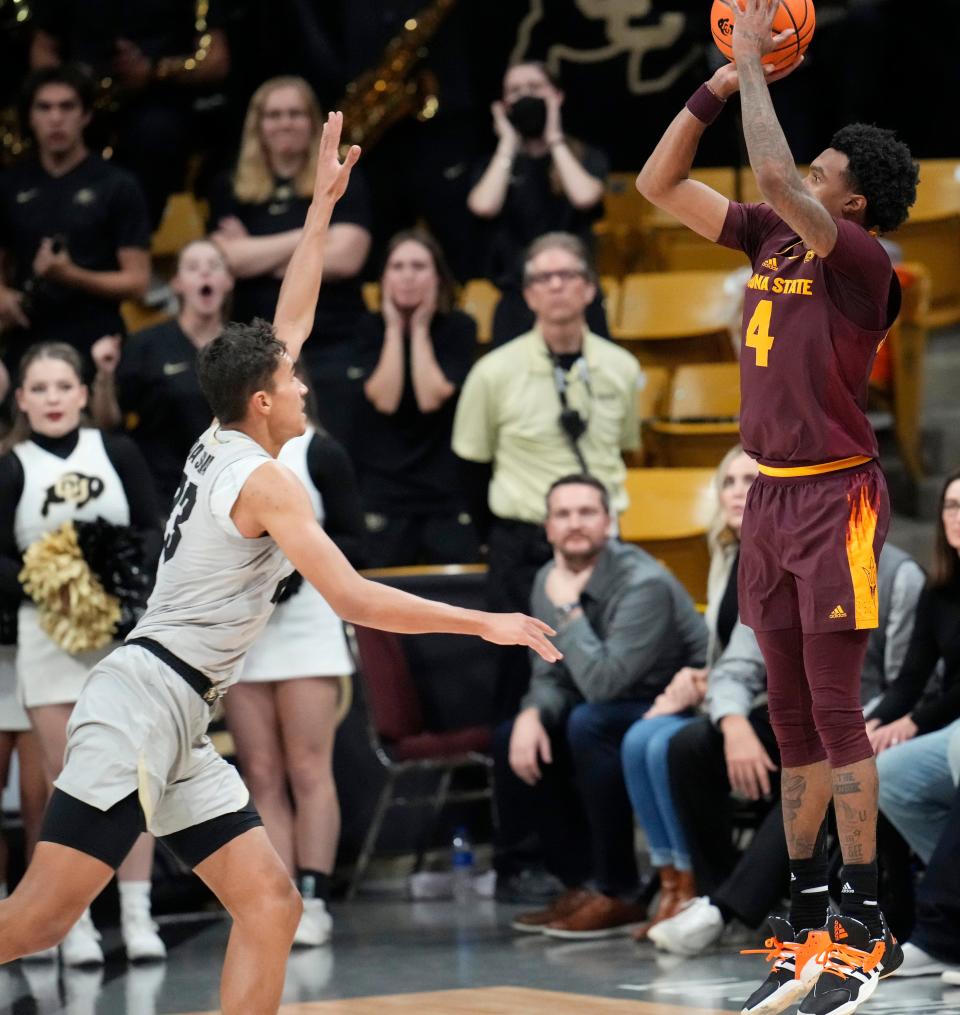 Arizona State guard Desmond Cambridge Jr. shoots a 3-point basket with 2.9 seconds remaining to beat Colorado on Dec. 1, 2022, in Boulder. Colorado forward Tristan da Silva, left, tries to defend on the play.