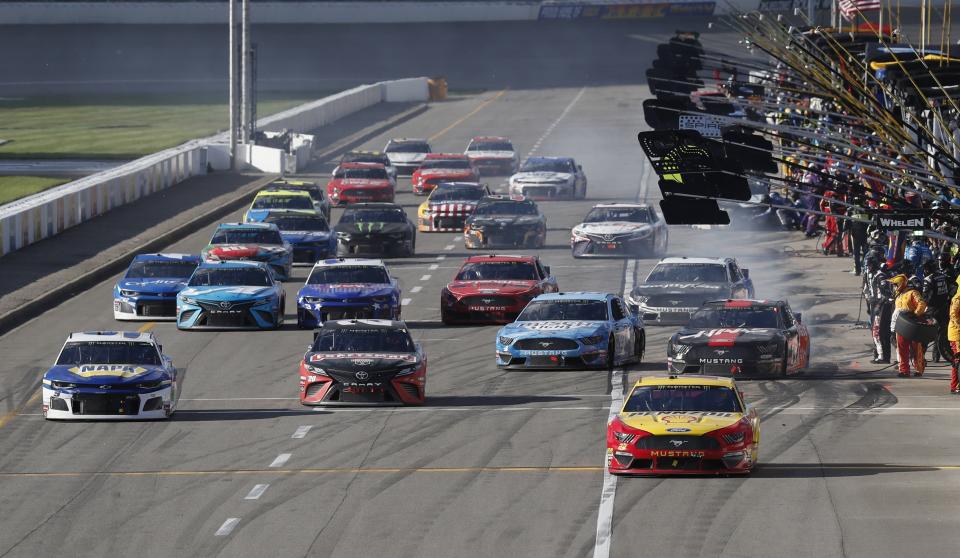 Joey Logano leads the field first out of the pits during the NASCAR Cup Series auto race at Michigan International Speedway, Monday, June 10, 2019, in Brooklyn, Mich. (AP Photo/Carlos Osorio)