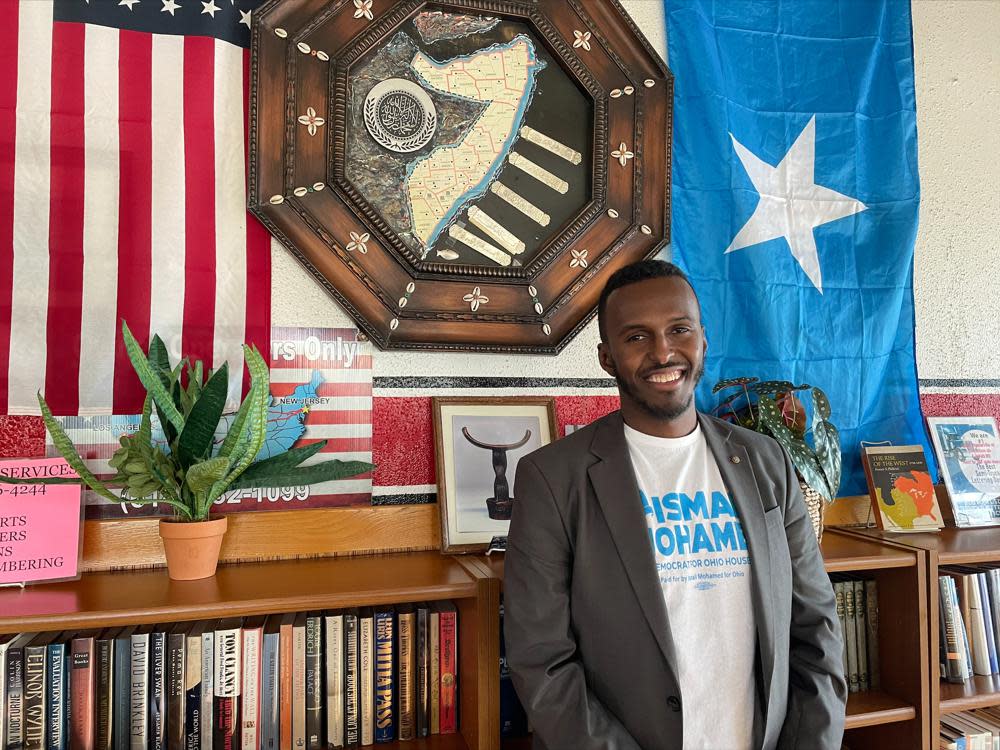 Democratic candidate for Ohio House of Representatives Ismail Mohamed poses for a photo in a Somali restaurant, Sept. 30, 2022, in Columbus, Ohio. The 30-year-old could be the state’s first Somali and Muslim man elected to the Ohio Legislature if he wins in the 2022 midterms. Columbus is home to the second-largest Somali population in the United States. (AP Photo/Samantha Hendrickson)