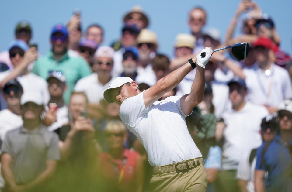 Rory McIlroy tees off at Royal St George's (PA Wire)