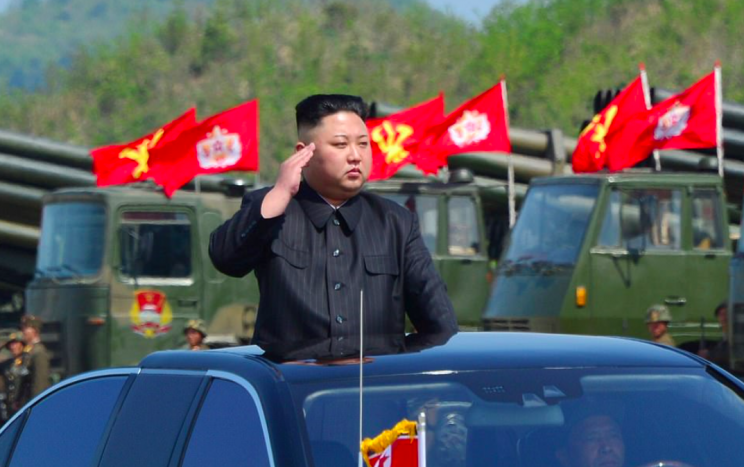 Kim Jong-Un saluted the North Korean military from the comfort of his private car. (Pic: Reuters)