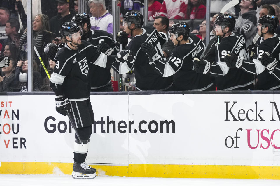 Los Angeles Kings right wing Adrian Kempe (9) is congratulated for his goal against the Detroit Red Wings during the first period of an NHL hockey game Thursday, Jan. 4, 2024, in Los Angeles. (AP Photo/Jae C. Hong)