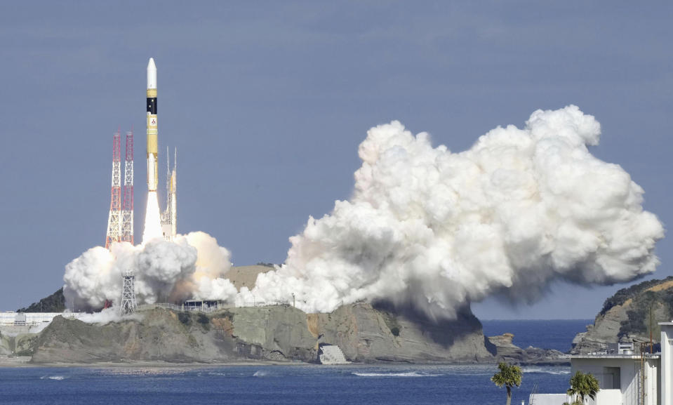 An H2A rocket is lifted from the launch pad at Tanegashima Space Center in Kagoshima, southern Japan Friday, Jan. 12, 2024. (Kyodo News via AP)