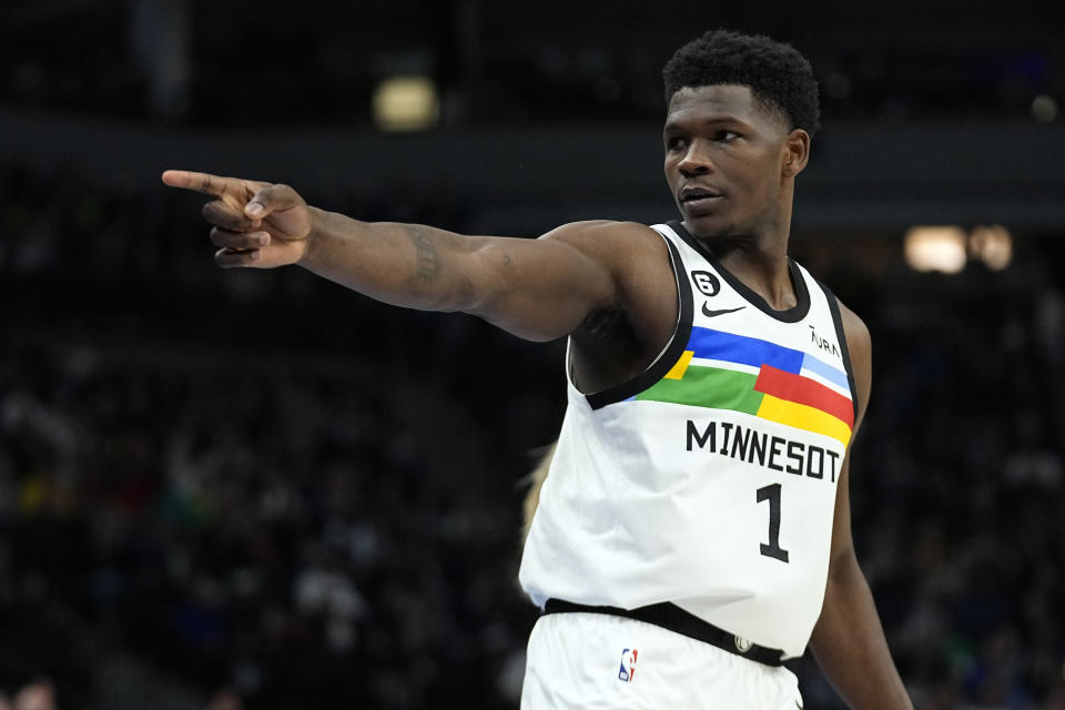 Minnesota Timberwolves guard Anthony Edwards (1) celebrates after making a three-point basket during the first half of an NBA basketball game against the Portland Trail Blazers, Sunday, April 2, 2023, in Minneapolis. (AP Photo/Abbie Parr)