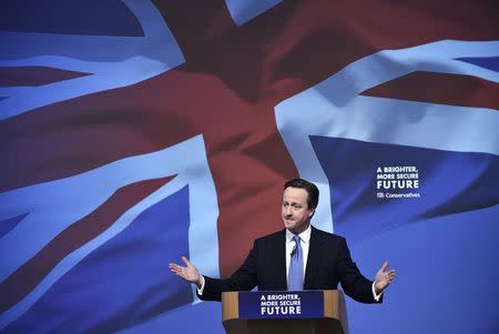 Britain's Prime Minsiter David Cameron launches the Conservative Party's election manifesto in Swindon, western England, April 14, 2015. REUTERS/Toby Melville