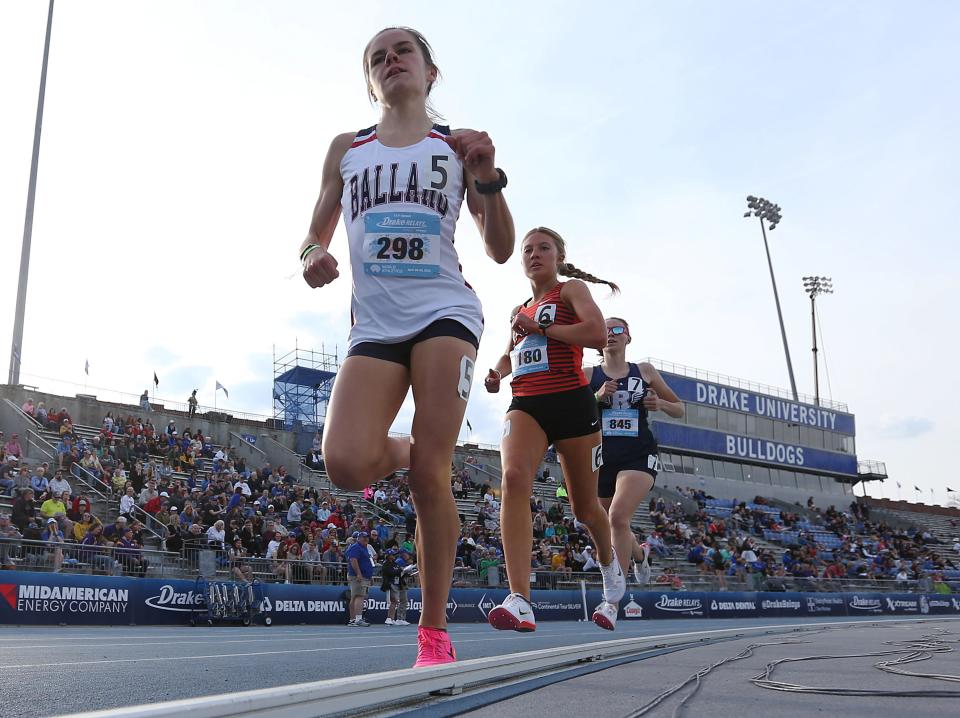 Ballard's Paityn Noe and West Des Moines Valley's Addison Dorenkamp battle for the lead during girls 300-meter run in the Drake Relays at Drake Stadium on Thursday, April 27, 2023, in Des Moines, Iowa.