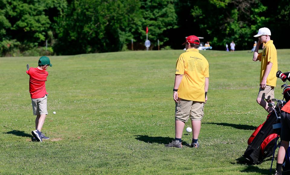 Malachi Kelley takes a shot on one of the range holes at the Brookside Junior Golf program that is celebrating it's 50th year this year on Monday, June 27, 2022. TOM E. PUSKAR/ASHLAND TIMES-GAZETTE