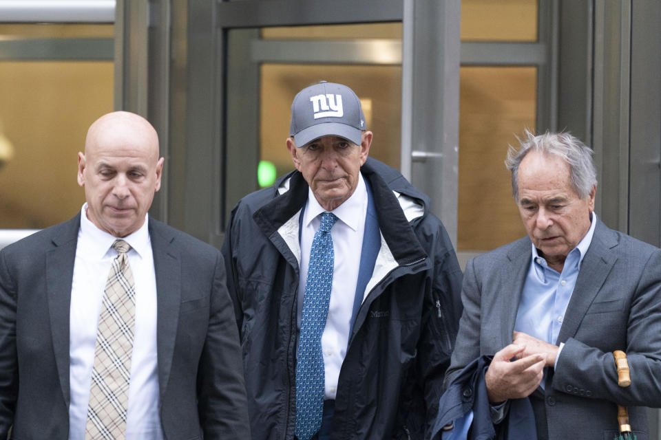 Tom Barrack, center, leaves Brooklyn Federal Court, Monday, Oct. 24, 2022, in the borough of New York. Barrack, a close ally of former President Donald Trump has taken the witness stand at his federal trial to dispute charges he secretly fed confidential information about the Trump administration to the United Arab Emirates. (AP Photo/Mary Altaffer)