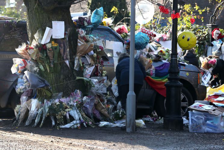 Fans left flowers outside George Michael’s home.