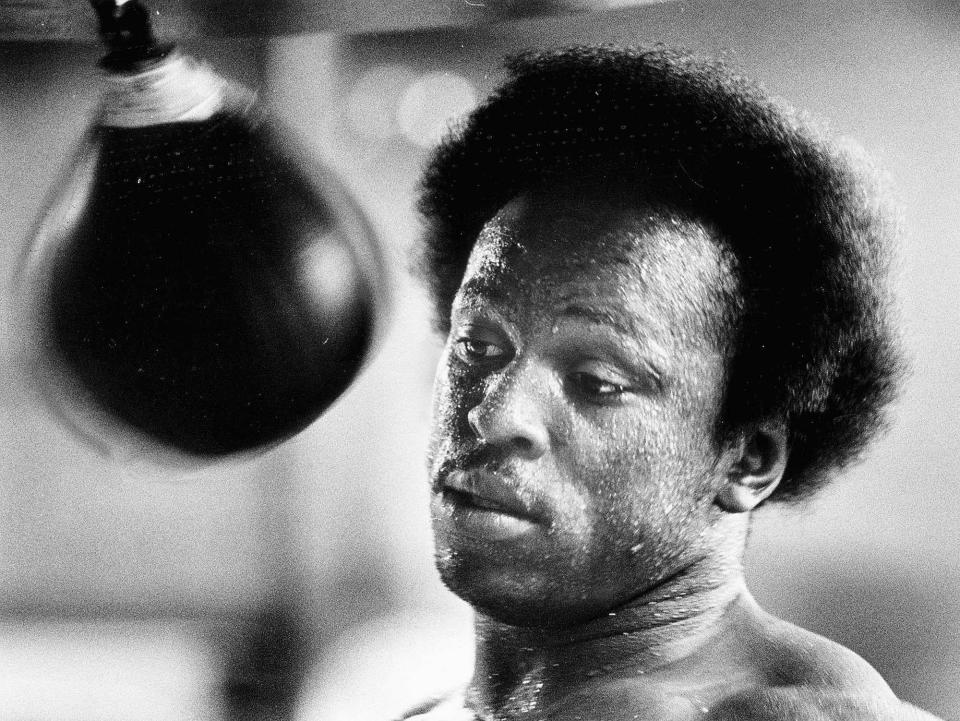 Michael Dokes works out during his days at the top of the heavyweight division in the early 1980s. Dokes won a title in 1982, lost it in 1983.