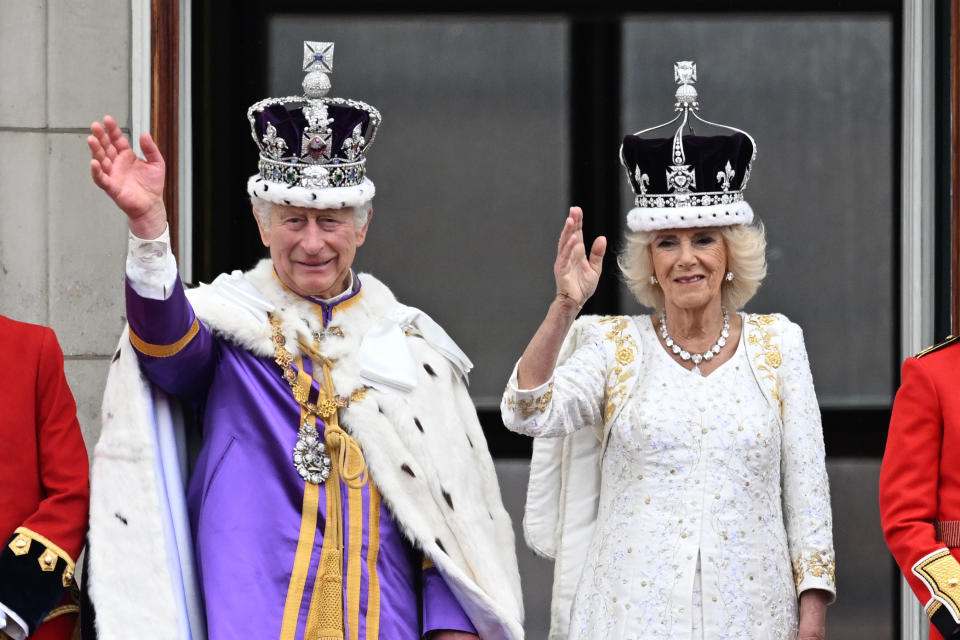 <p>LONDON, ENGLAND - MAY 06: King Charles III and Queen Camilla wave from the Buckingham Palace balcony during the Coronation of King Charles III and Queen Camilla on May 06, 2023 in London, England. The Coronation of Charles III and his wife, Camilla, as King and Queen of the United Kingdom of Great Britain and Northern Ireland, and the other Commonwealth realms takes place at Westminster Abbey today. Charles acceded to the throne on 8 September 2022, upon the death of his mother, Elizabeth II. (Photo by Samir Hussein/WireImage)</p> 