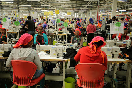 Workers sew clothes inside the Indochine Apparel PLC textile factory in Hawassa Industrial Park in Southern Nations, Nationalities and Peoples region, Ethiopia November 17, 2017. Picture taken November 17, 2017.REUTERS/Tiksa Negeri