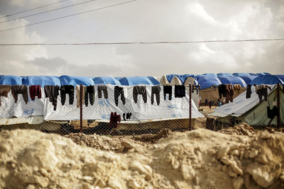 Laundry dries on a chain-link fence at al-Hol camp, in the section where foreign families from Islamic State-held areas are housed, Hasakeh province, Syria on March 31, 2019. (Maya Alleruzzo / AP file)