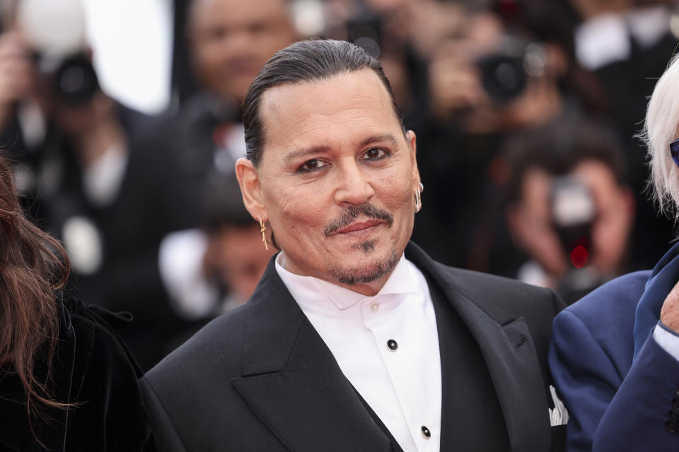 Johnny Depp poses for photographers upon arrival at the opening ceremony and the premiere of the film 'Jeanne du Barry' at the 76th international film festival, Cannes, southern France, Tuesday, May 16, 2023. (Photo by Vianney Le Caer/Invision/AP)