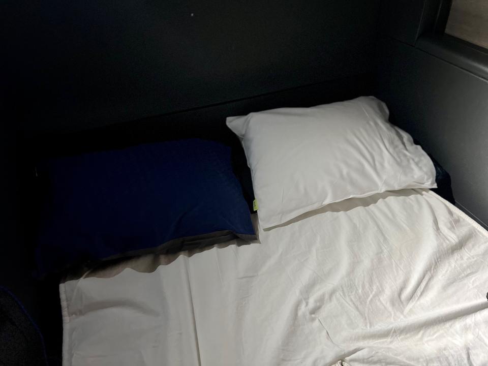 The pillows on "The Room" business class lie-flat bed.