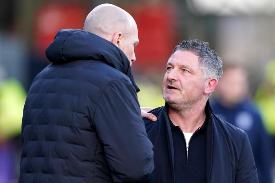 Dundee manager Tony Docherty, right, speaks to his Rangers counterpart Philippe Clement at Dens Park <i>(Image: PA)</i>