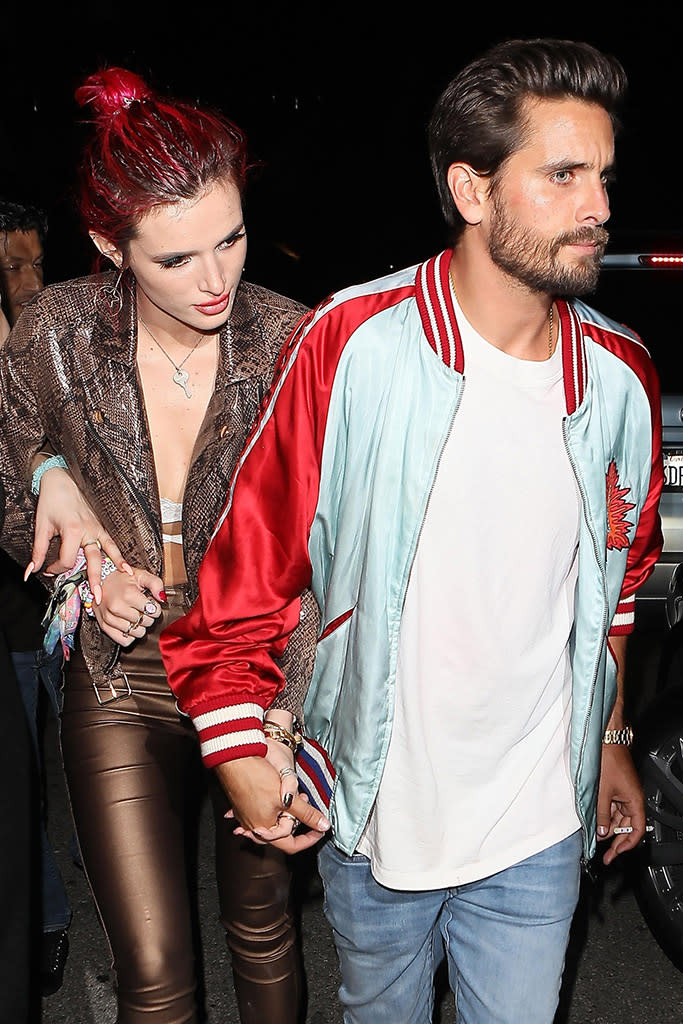 <p>So, wait, are Bella and Scott a thing again? The Disney Channel alum said the <i>Keeping Up With the Kardashians</i> star was partied too hard for her liking, but that didn’t stop her from holding hands with him as they left Lana Del Rey’s birthday bash together. (Photo: BACKGRID) </p>