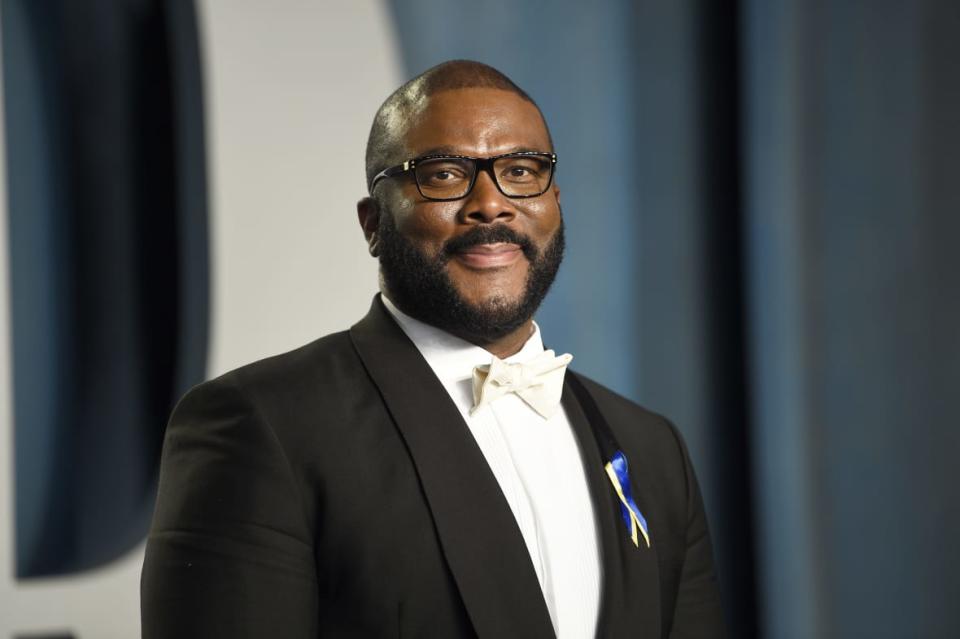 Tyler Perry arrives on March 27, 2022, at the Vanity Fair Oscar Party in Beverly Hills in this file photo. Perry’s sitcoms “House of Payne” and “Assisted Living” are returning to BET this week. (Photo by Evan Agostini/Invision/AP, File)