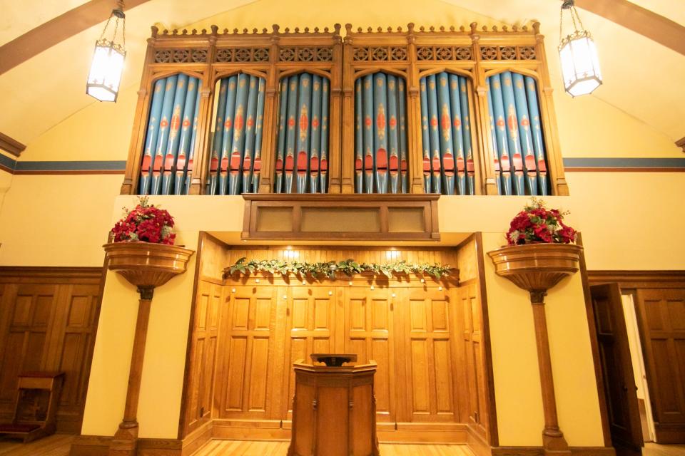 Pipes over the altar at Kelmscott Chapel and Concert Hall, shown Thursday, Jan. 20, 2022, are decorative only. They are built into the framework for two confessionals that were once on either side of the chapel.