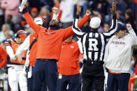 Auburn interim head coach Carnell Williams reacts as referee Scott Walker signals touchdown during the first half of an NCAA college football game against Western Kentucky, Saturday, Nov. 19, 2022, in Auburn, Ala. (AP Photo/Butch Dill)