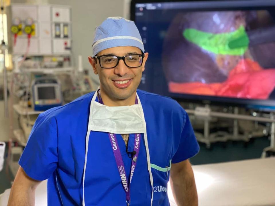 Dr. Amin Madani, a general surgeon with the Sprott Department of Surgery at the University Health Network in Toronto, has developed a prototype that uses artificial intelligence to guide surgeons during gallbladder surgery. (Paul Borkwood/CBC News - image credit)