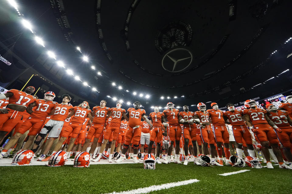 Clemson gathers after their loss against Ohio State in the Sugar Bowl NCAA college football game Friday, Jan. 1, 2021, in New Orleans. Ohio State won 49-28. (AP Photo/Gerald Herbert)