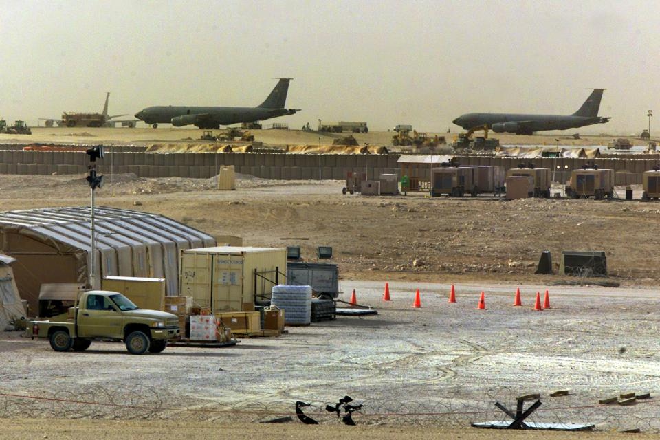 FILE - American military planes and support facilities are seen at the Al Udeid Air Base outside Doha, Qatar, March 17, 2002. Qatar will be on the world stage like it never has before as the small, energy-rich nations hosts the 2022 FIFA World Cup beginning this November. (AP Photo/J. Scott Applewhite, File)