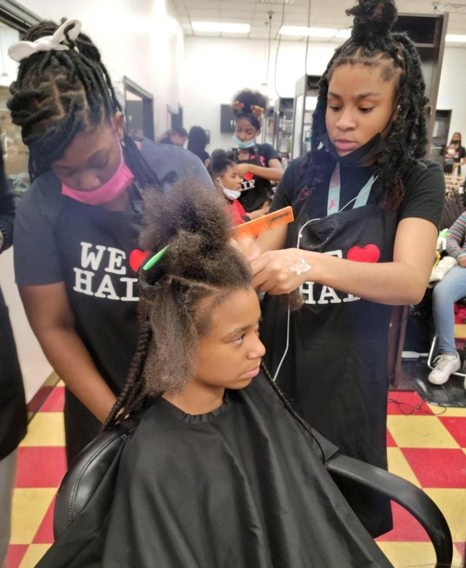 Petersburg High School students participate in the cosmetology and barber program.
