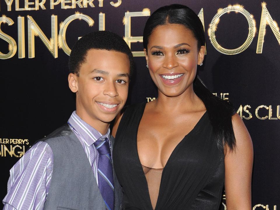 Nia Long and son Massai Z. Dorsey arrive at the Los Angeles premiere of 'Tyler Perry's The Single Moms Club' at ArcLight Cinemas Cinerama Dome on March 10, 2014 in Hollywood, California