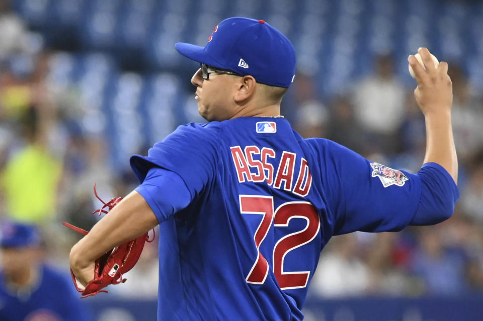 Chicago Cubs starting pitcher Javier Assad throws to a Toronto Blue Jays batter in first-inning baseball game action in Toronto, Monday, Aug. 29, 2022. (Jon Blacker/The Canadian Press via AP)