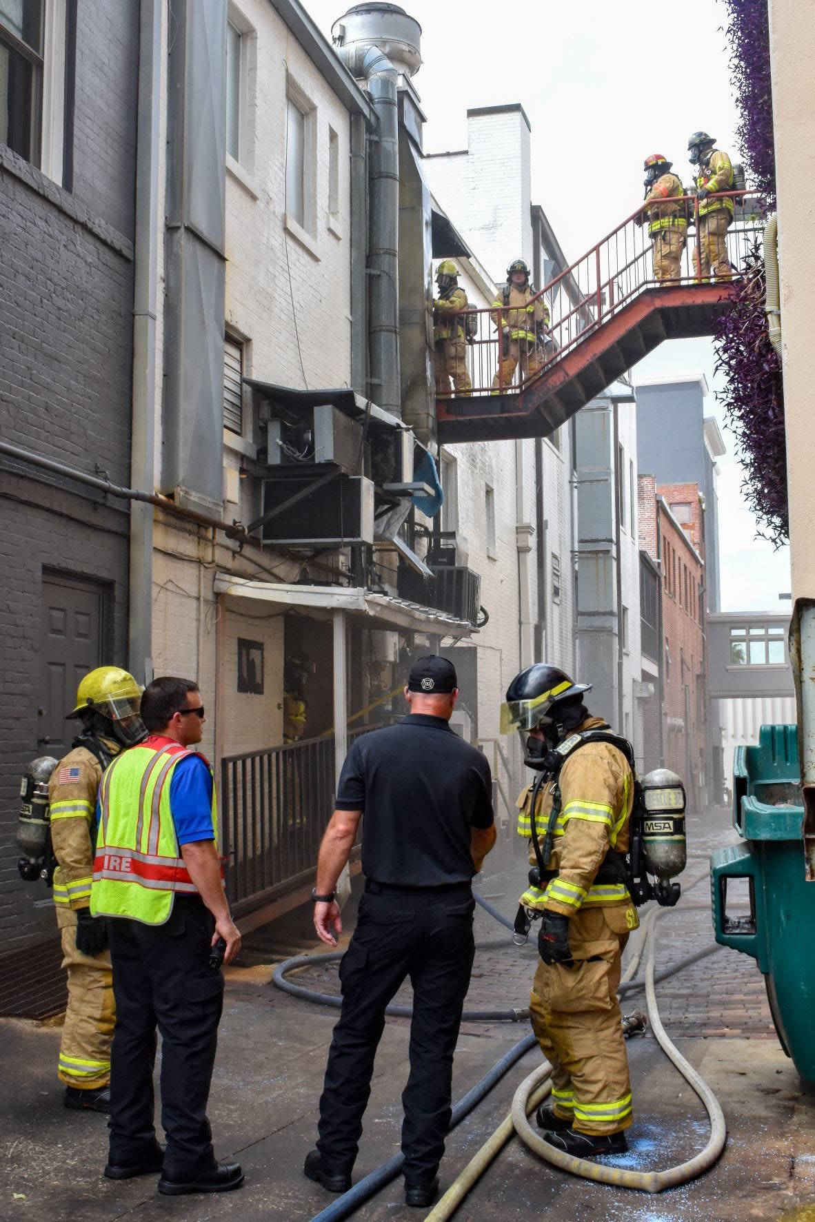 Lakeland Fire Department responded to calls of a structure fire at Harry's Seafood Bar and Grille around 3 p.m. Wednesday. Firefighter checked the building to ensure flames had not spread.