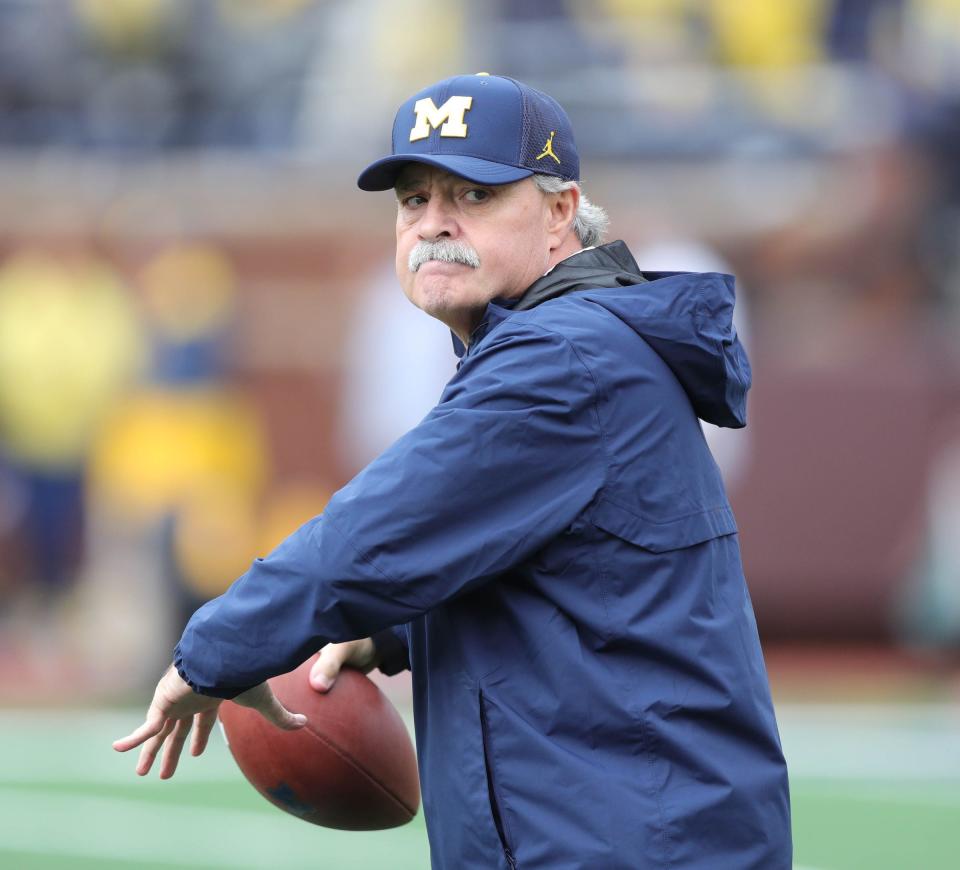 Michigan defensive coordinator Don Brown warms up players before action against Maryland, Saturday, Oct. 6, 2018 at Michigan Stadium.