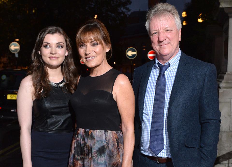 Lorraine Kelly with her daughter Rosie and husband Steve Smith in 2014 (AP)