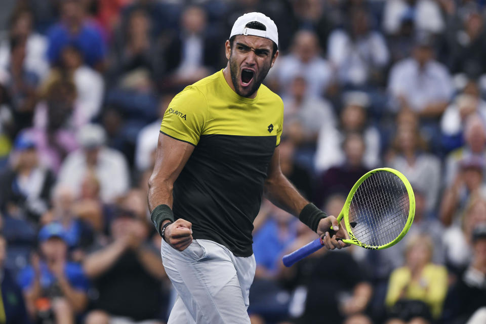 FILE - In this Sept. 23, 2019, file photo, Matteo Berrettini, of Italy, yells and pumps his fist after winning a point against Andrey Rublev, of Russia, during the fourth round of the U.S. Open tennis championships in New York. Berrettini will be competing in the Australian Open tennis tournament beginning Monday, Jan. 20, 2020. (AP Photo/Sarah Stier, File)