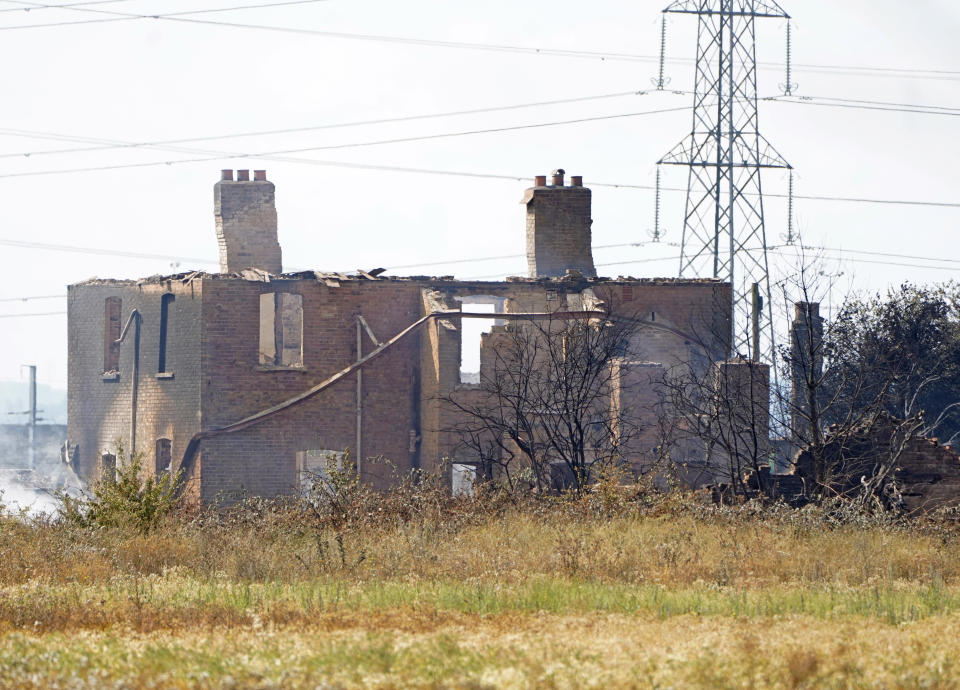 The scene after a blaze in the village of Wennington, east London after temperatures topped 40C in the UK for the first time ever, as the sweltering heat fuelled fires and widespread transport disruption. Picture date: Wednesday July 20, 2022.