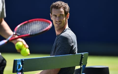 Britain's Andy Murray takes a break during practice, ahead of his first round match at the ATP Queen's Club Championships tennis tournament in west London on June 18, 2018. Finally recovered after hip surgery in January, Murray will play his first competitive match for 11 months in the Queen's Club first round next week - Credit: AFP