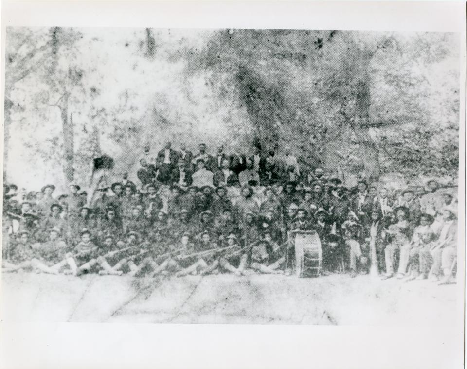 Morris Givens Band and Negro National Guard at Juneteenth Celebration at Wheeler's Grove, June 19, 1900.