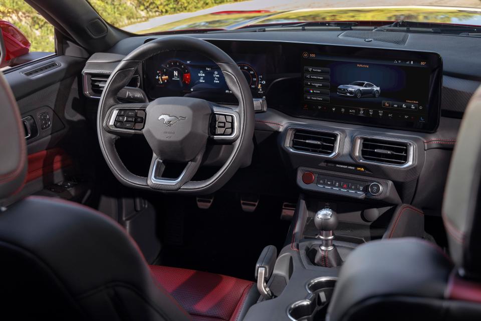 The Mustang's traditional 'double-brow'   dashboard has been replaced by an instrument panel with a 12.4-inch high-def instrument cluster and 13.2-inch touch screen in the 2024 model.