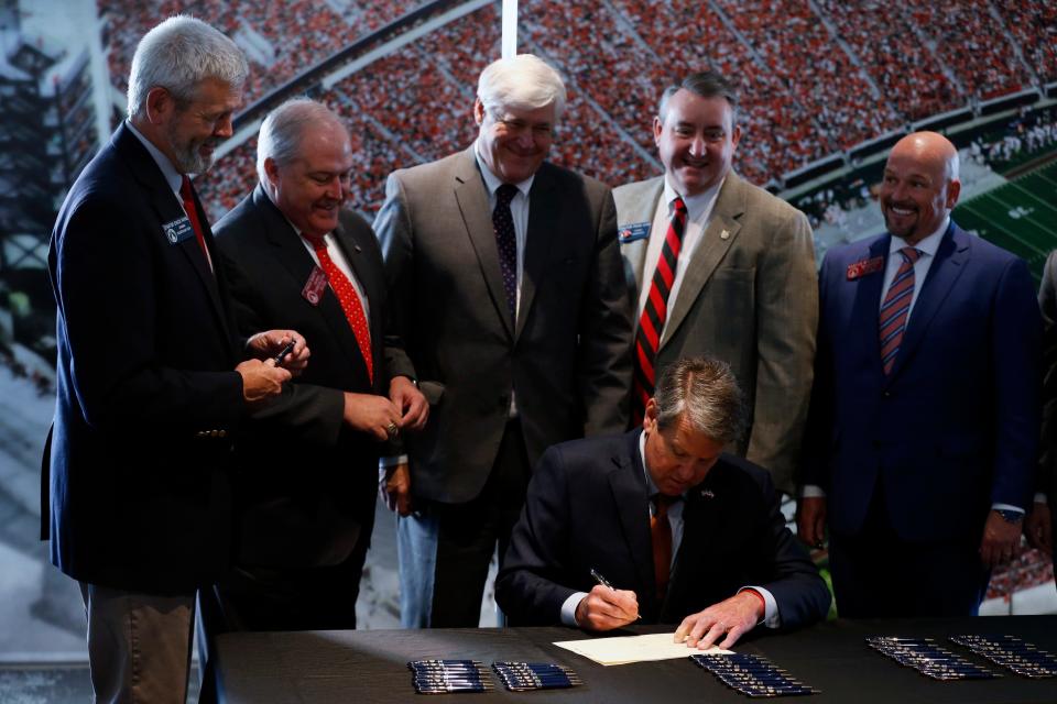 Georgia Gov. Brian Kemp signs House Bill 617 which will allow student athletes to control and earn money off their name, image, and likeness.