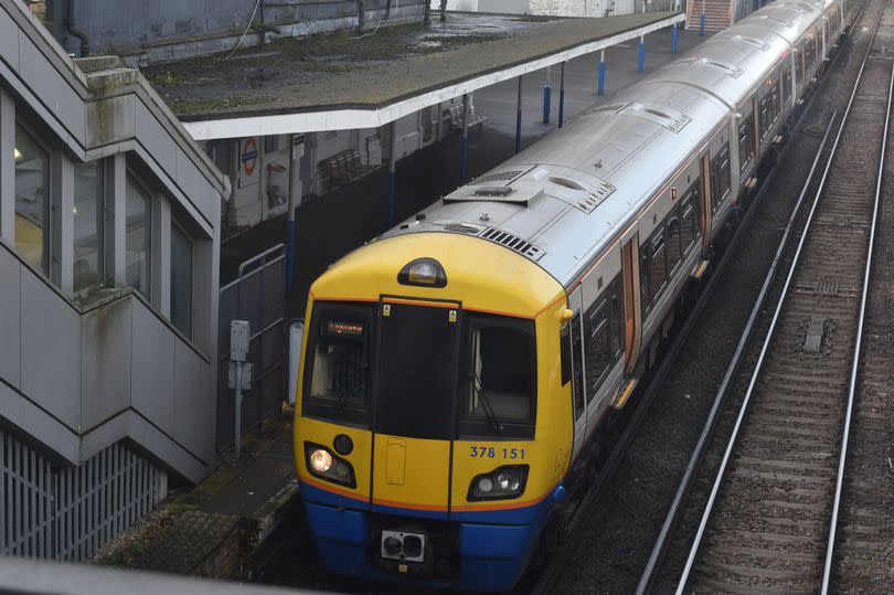 A train at a London Overground platform viewed from above