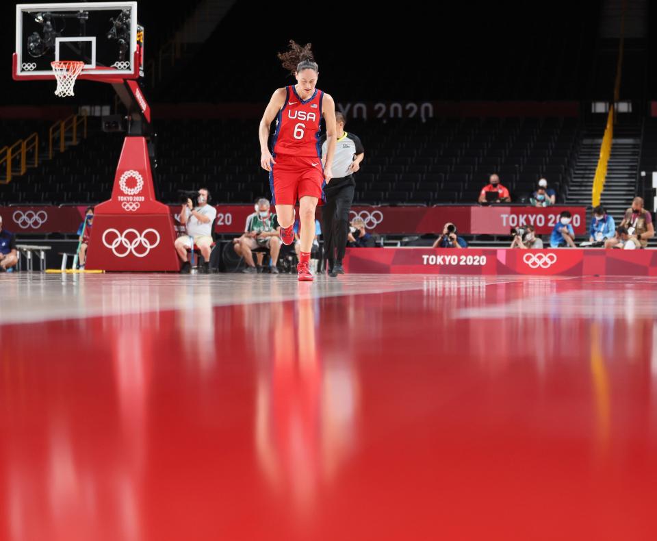 Sue Bird runs down the court.