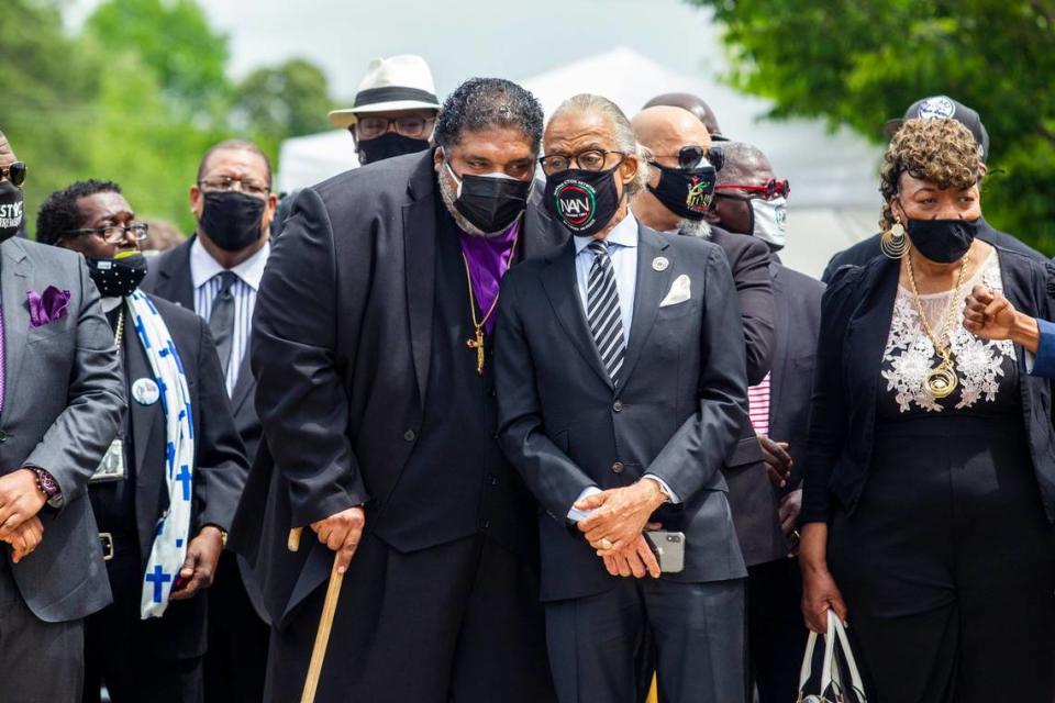 Rev. William Barber II, center left, and Rev. Al Sharpton speak before the funeral service for Andrew Brown Jr. at the Fountain of Life Church in Elizabeth City, NC May 3, 2021. Brown was shot and killed by Pasqoutank County Sheriff deputies in April.