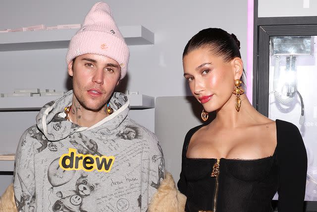 <p>Jerritt Clark/Getty Images</p> Justin Bieber and Hailey Bieber at the 2023 Grand Opening of OBB Studios