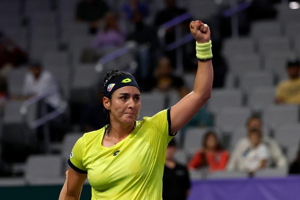 World number two Ons Jabeur has recovered from an upset to become the first Tunisian to win a WTA Finals match (Tim Heitman/AP) (AP)