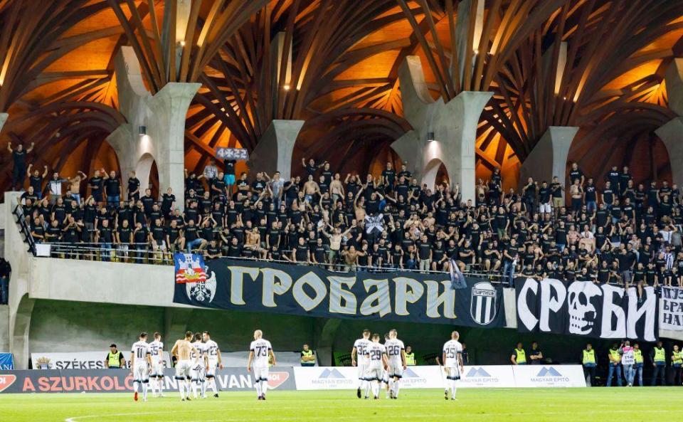 Partizan Belgrade players and fans celebrate a win over Hungarian side Videoton at the Pancho Arena in August 2017